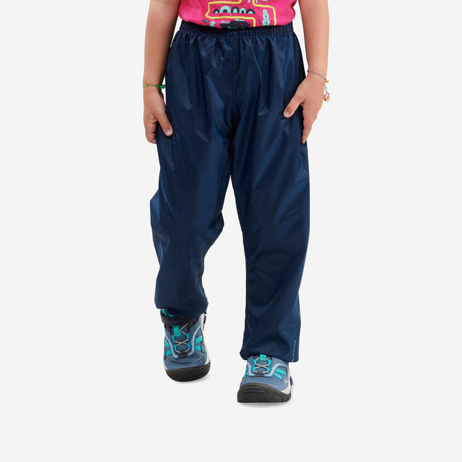 





Surpantalon de randonnée imperméable enfant 2-6 ans, MH100 bleu noir, photo 1 of 11