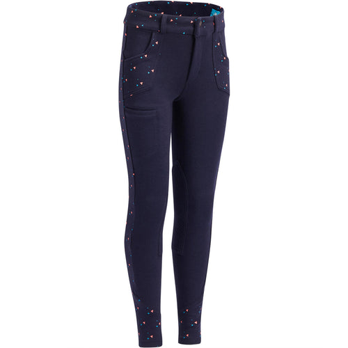 





Pantalon équitation fille 120 PRINT marine à points rose